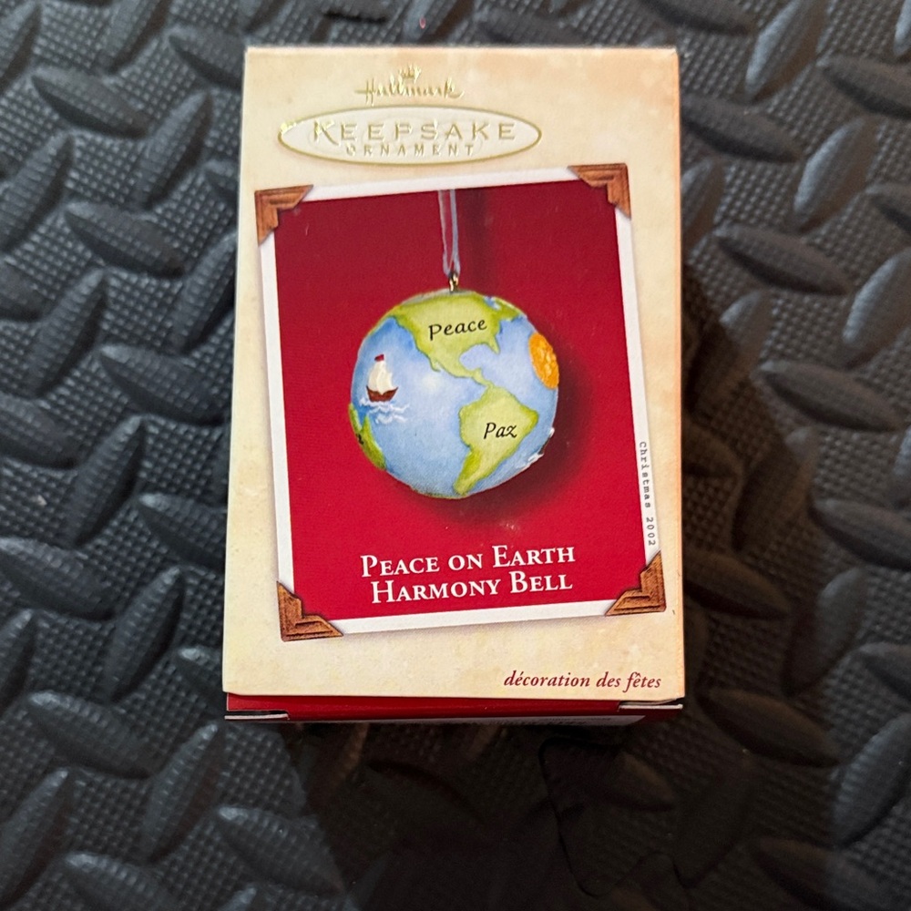 Hallmark Keepsake Peace on Earth Harmony Bell metal ornament from 2002